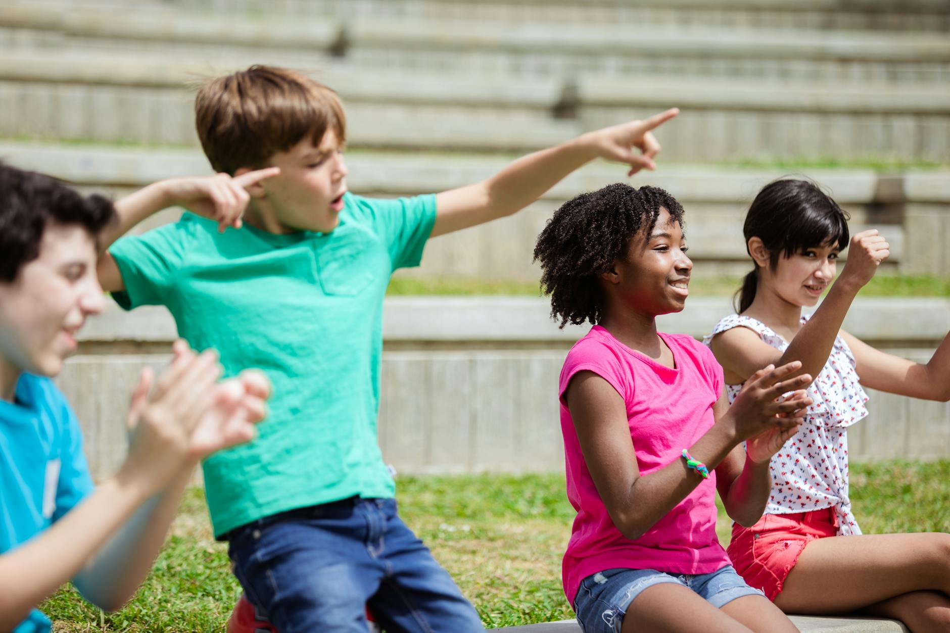children cheering and clapping