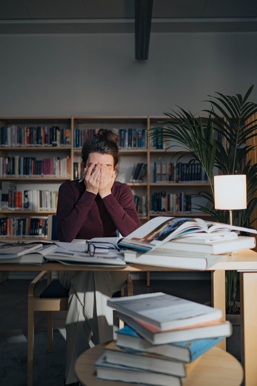 photo of woman covering her face